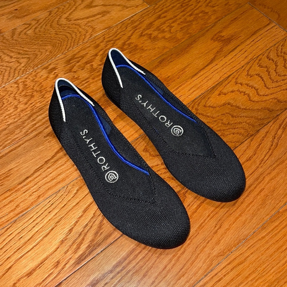 Rothy’s The Flat black with white halo top size 6. Never worn